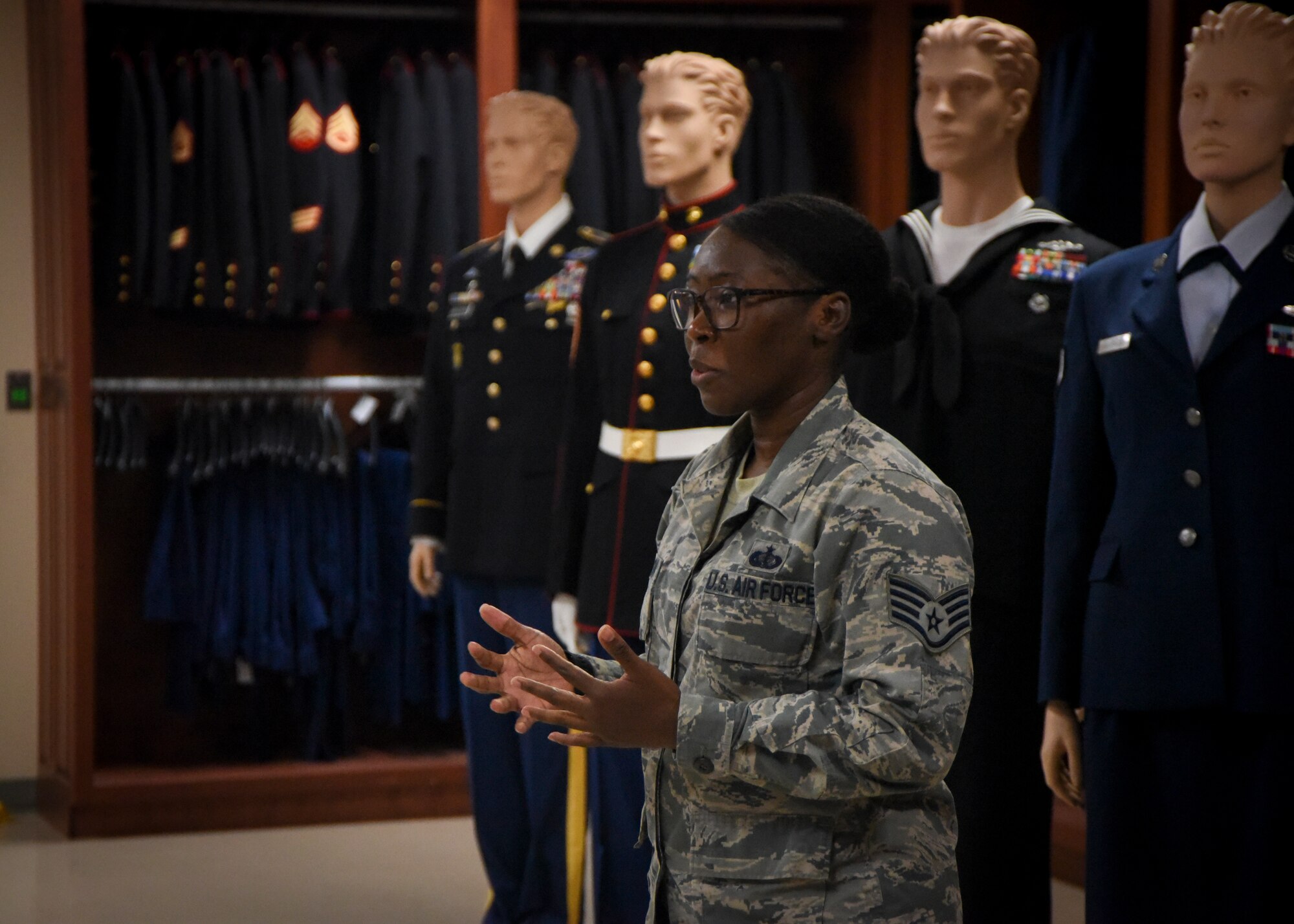 Staff Sgt. Michelle Johnson briefs guests during an orientation.