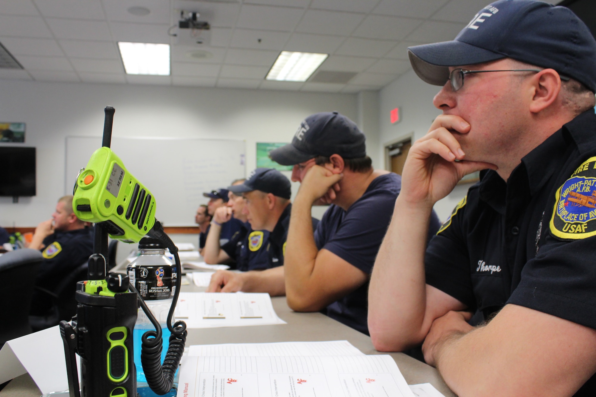Spending many hours confined to the firehouse along with witnessing traumatic incidents on emergency calls can become stressors of the job of a firefighter. To help alleviate some of those stressors, firefighters attended a two-day Post-Traumatic Stress Disorder/Peer Support program training June 5-6. (U.S. Air Force photos/Stacey Geiger)