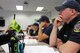 Spending many hours confined to the firehouse along with witnessing traumatic incidents on emergency calls can become stressors of the job of a firefighter. To help alleviate some of those stressors, firefighters attended a two-day Post-Traumatic Stress Disorder/Peer Support program training June 5-6. (U.S. Air Force photos/Stacey Geiger)