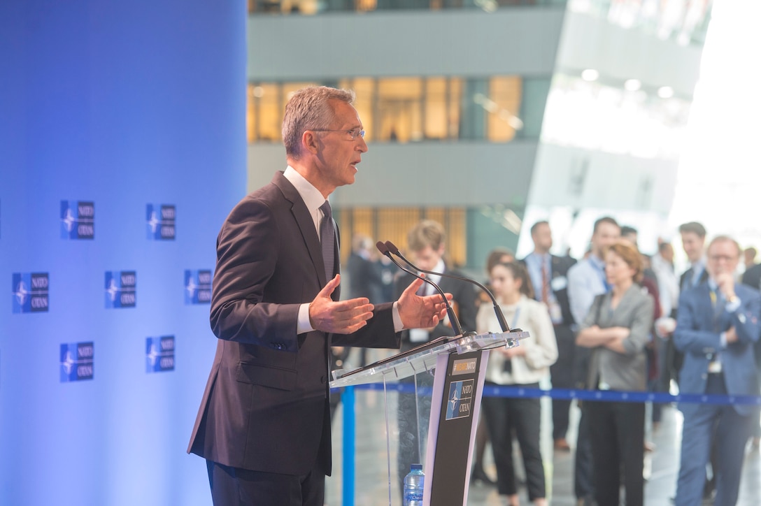 NATO Secretary General Jens Stoltenberg speaks to the press at the alliance headquarters in Brussels.