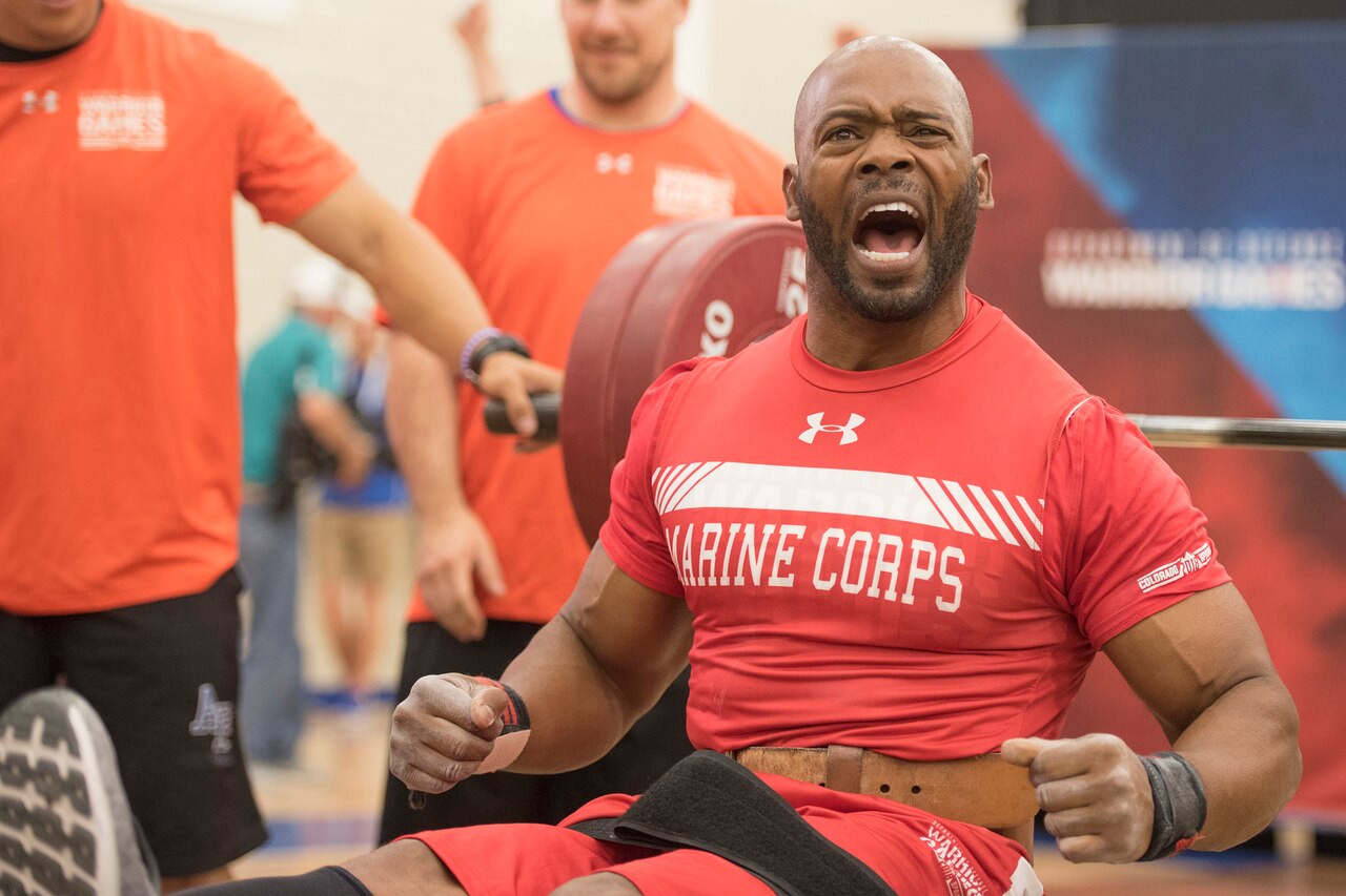 Marine Corps Master Gunnery Sgt. Carnell Martin competes in powerlifting during the 2018 DoD Warrior Games at the U.S. Air Force Academy in Colorado Springs, Colo.