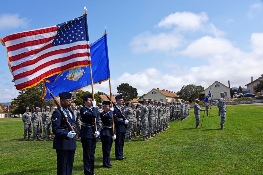 U.S. Air Force Color Guard with the 517th Training Group presents the U.S. and Air Force flags during the 314th Training Squadron Change of Command at the Presidio of Monterey, California, June 6, 2018. The change of command ceremony is a time honored military tradition that signifies the orderly transfer of authority. (U.S. Army photo by Natela Cutter/Released)