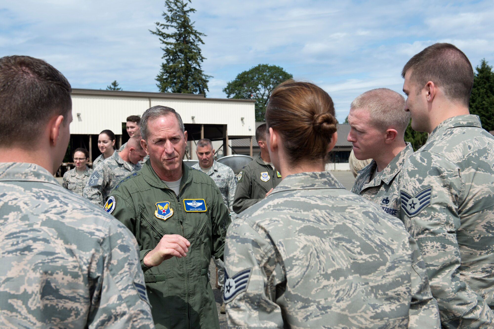 Gen David Goldfein, Chief of Staff of the Air Force, talks with members of the 62nd Aerial Port Squadron, June 5, 2018, at Joint Base Lewis-McChord, Wash. Goldfein and the Airmen had the opportunity to discuss how they support not only Airmen but Soldiers as well as part of the joint base. (U.S. Air Force photo by A1C Sara Hoerichs)