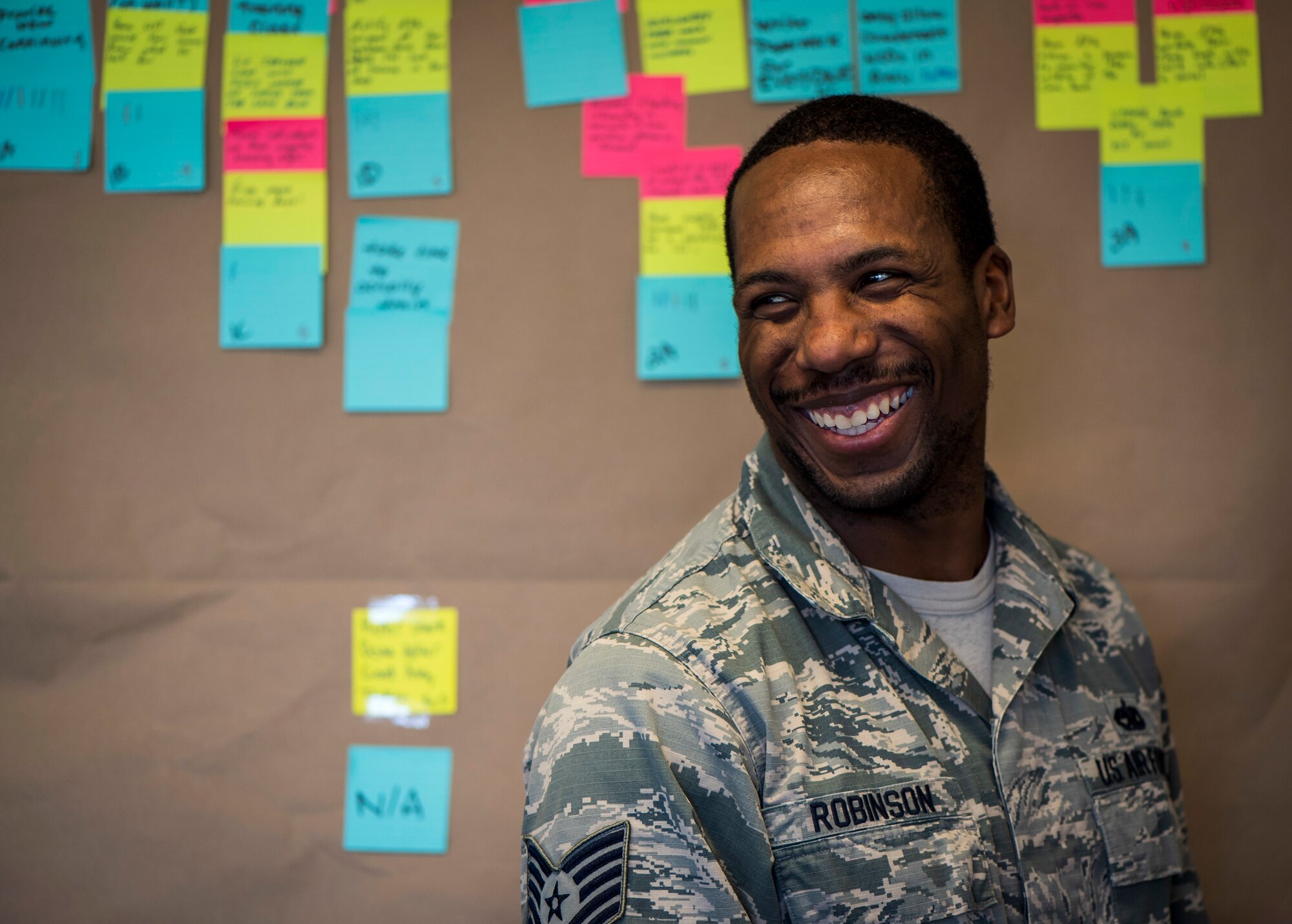 U.S. Air Force Tech. Sgt. Teko Robinson, the 35th Maintenance Squadron crash damage and disabled aircraft recovery team chief, smiles during the Continuous Process Improvement program at Misawa Air Base, Japan, May 22, 2018. The CPI program is one example of how the Air Force is supporting innovation and reducing redundant practices by educating Airmen on how they can improve their units.