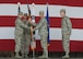 U.S. Air Force Col. Terrence Walter, 8th Mission Support Group commander, receives the guidon from Col. John Bosone, 8th Fighter Wing commander, during a change of commander ceremony at Kunsan Air Base, Republic of Korea, June 8, 2018. Bosone presided over the ceremony in which Col. Michael Zuhlsdorf relinquished command of the 8th MSG to Walter. (U.S. Air Force photo by Staff Sgt. Victoria H. Taylor)