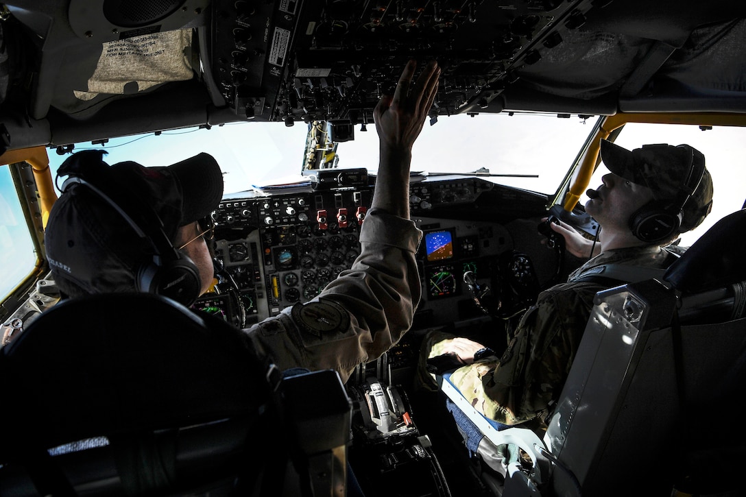 Air Force pilots fly a KC-135 Stratotanker on an in-flight refueling mission over Afghanistan.