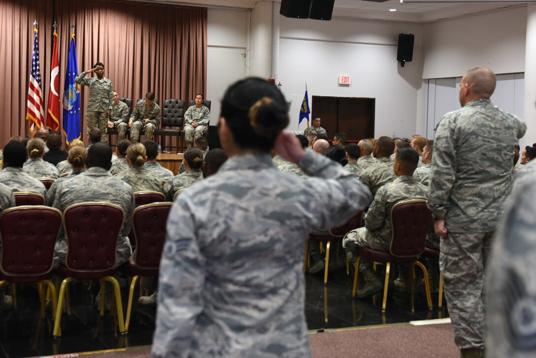 U.S. Air Force Lt. Col. Sarah Evans, 39th Medical Operations Squadron commander, renders her first salute as commander to the 39th MDOS Airmen at Incirlik Air Base, Turkey, June 8, 2018.