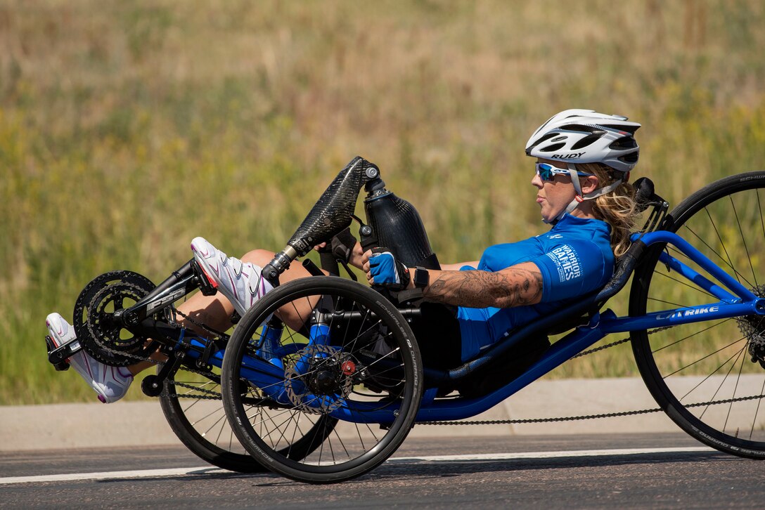 An airman competes in a cycling event during the 2018 Department of Defense Warrior Games.