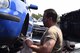 Brian Davidson searches for car parts at the 86th Force Support Squadron Auto Recycling Center near Ramstein Air Base, Germany, May 17, 2018. The Auto Recycling Center offers services for military members and their dependents looking to repair, get rid of, or purchase a car.