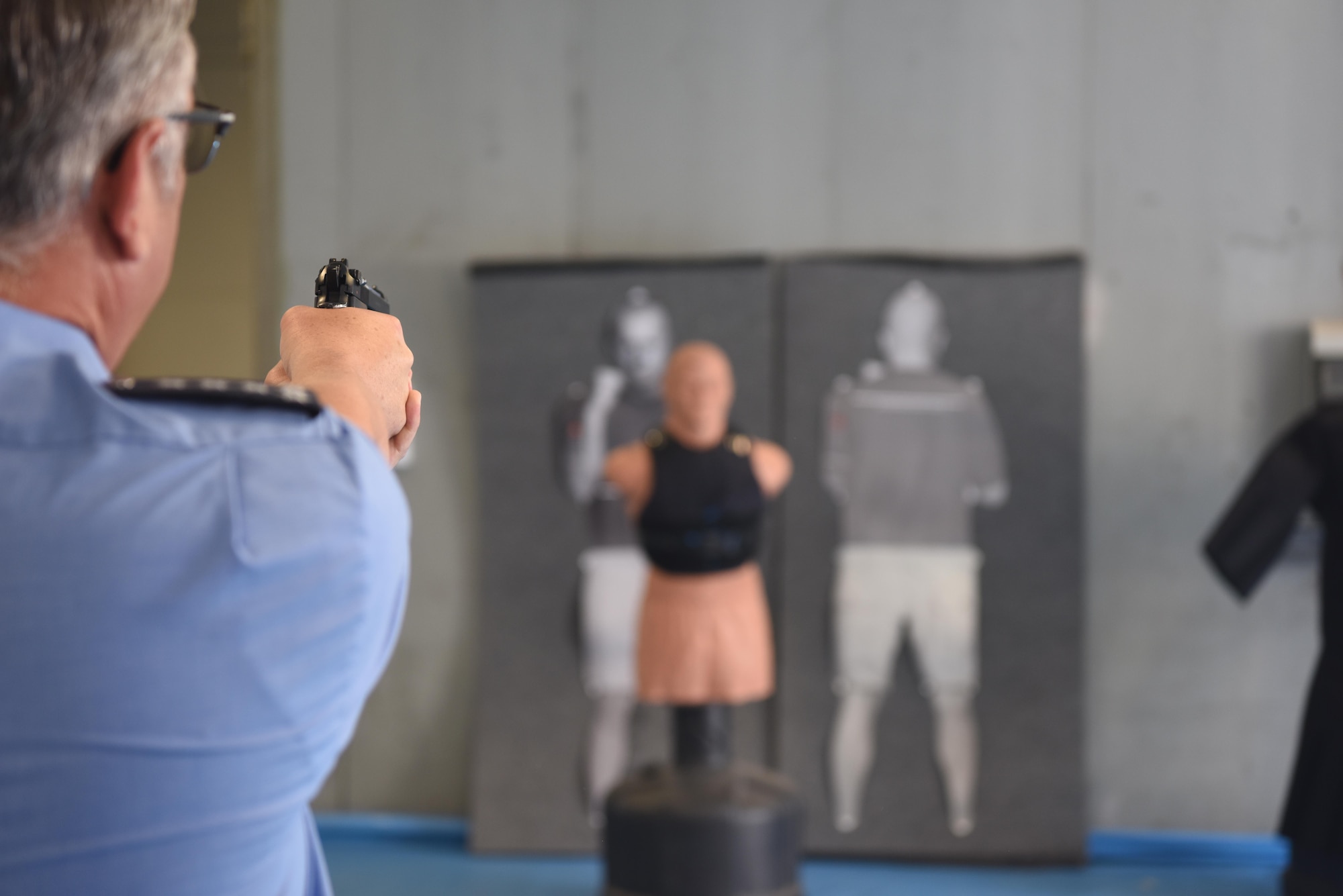 Stephan Christian, head of unit in Enkenbach-Alsenborn, shoots training bullets at a dummy target on Kapaun Air Station, Germany, June 6, 2018. The Polizei and the 569th U.S. Forces Police Squadron signed a memorandum of agreement that formalizes a training and working relationship that began in 1976.