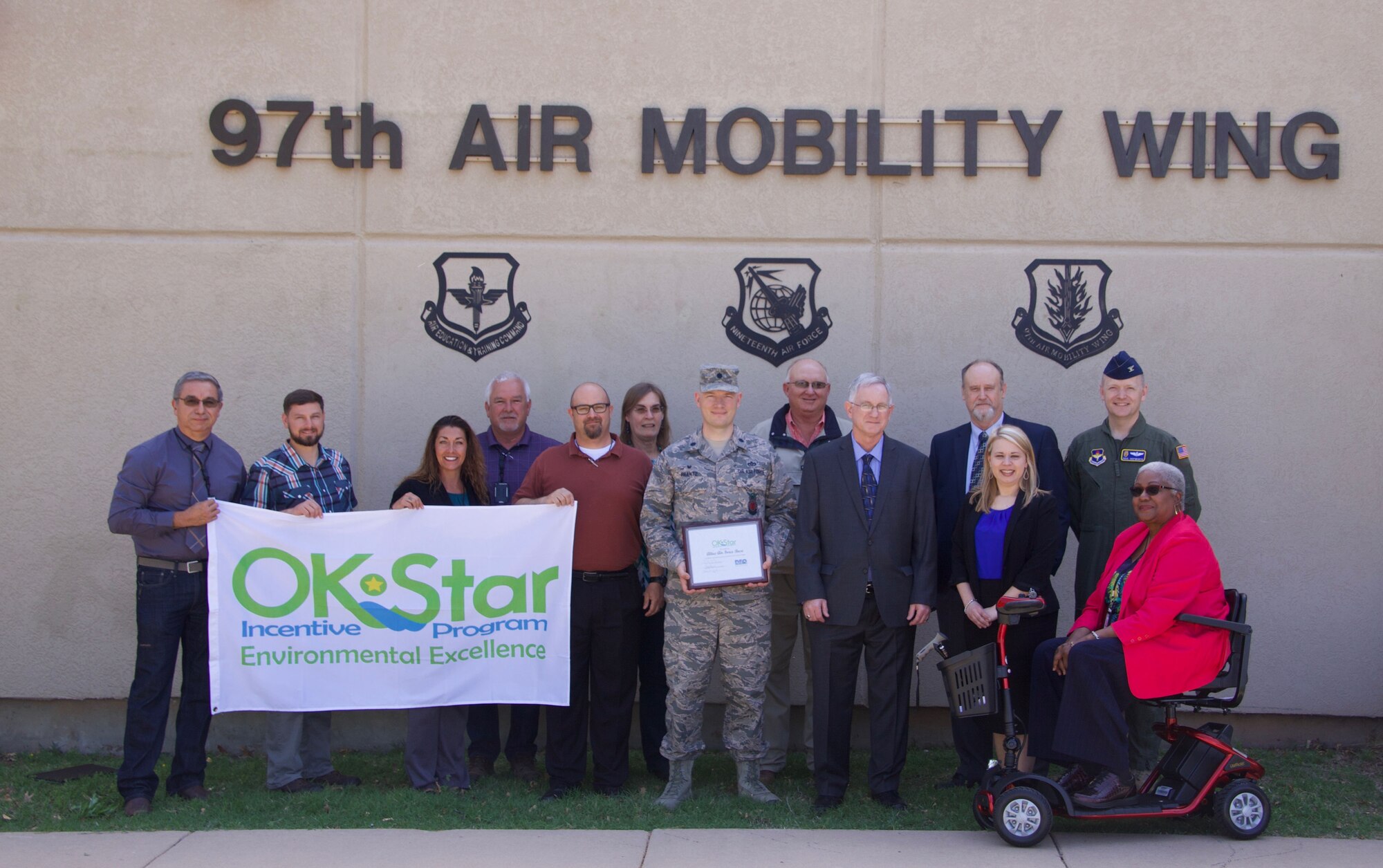 The 97th Civil Engineer Environmental Management Flight receives the Oklahoma Star, Platinum Star, award by the Oklahoma Department of Environmental Quality, joined by U.S. Air Force Col. Paul Skipworth, a vice commander assigned to the 97th Air Mobility Wing, and Col. Paul Frantz, a squadron commander assigned to the 97th CES, May 2, 2018, at Altus Air Force Base, Okla.