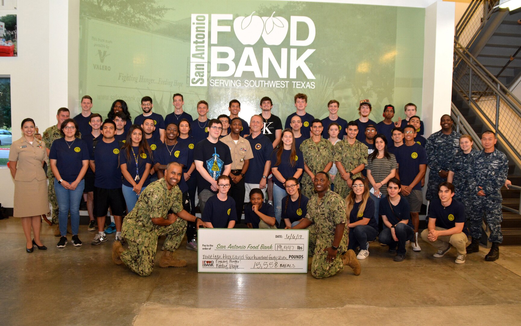 Recruiters and future Sailors of Navy Recruiting District San Antonio volunteered at the San Antonio Food Bank during a Delayed Entry Program  meeting June 6.  During the event, recruiters, along with more than 60 future Sailors and other volunteers, filled 575 bags of produce and sorted 19,447 pounds of food which will provide 15,558 meals for needy families.  The purpose of the volunteerism was to instill the “Whole Sailor Concept.”
