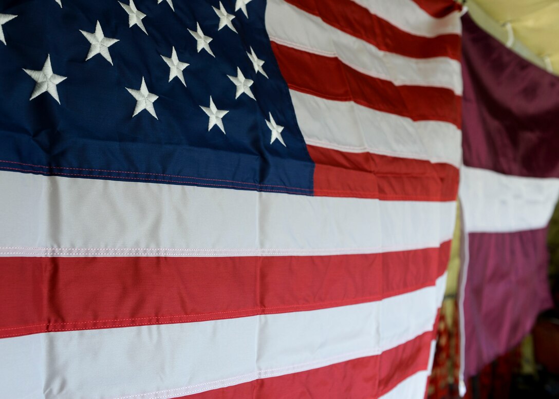 The U.S. and Latvian flags fly side by side in a KC-135 Stratotanker during Saber Strike over Latvia on June 6, 2018. Latvia is one of 19 countries participating in Saber Strike, an exercise aiming to improve capabilities and relations between the U.S. and its counterparts. (U.S. Air Force photo by Staff Sgt. Jimmie D. Pike)