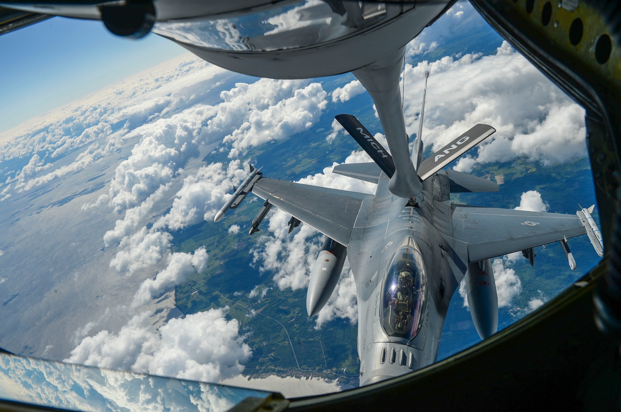 A U.S. Air Force F-16 Fighting Falcon deployed to U.S. Air Forces in Europe from the 120th Fighter Squadron at Buckley Air Force Base, Colorado receives fuel in flight by a KC-135 Stratotanker over Latvia during Saber Strike 18 June 6, 2018. The KC-135 aircraft provides aerial refueling capabilities for the U.S. and its partners allowing an enhanced projection of airpower. (U.S. Air Force photo by Staff Sgt. Jimmie D. Pike)