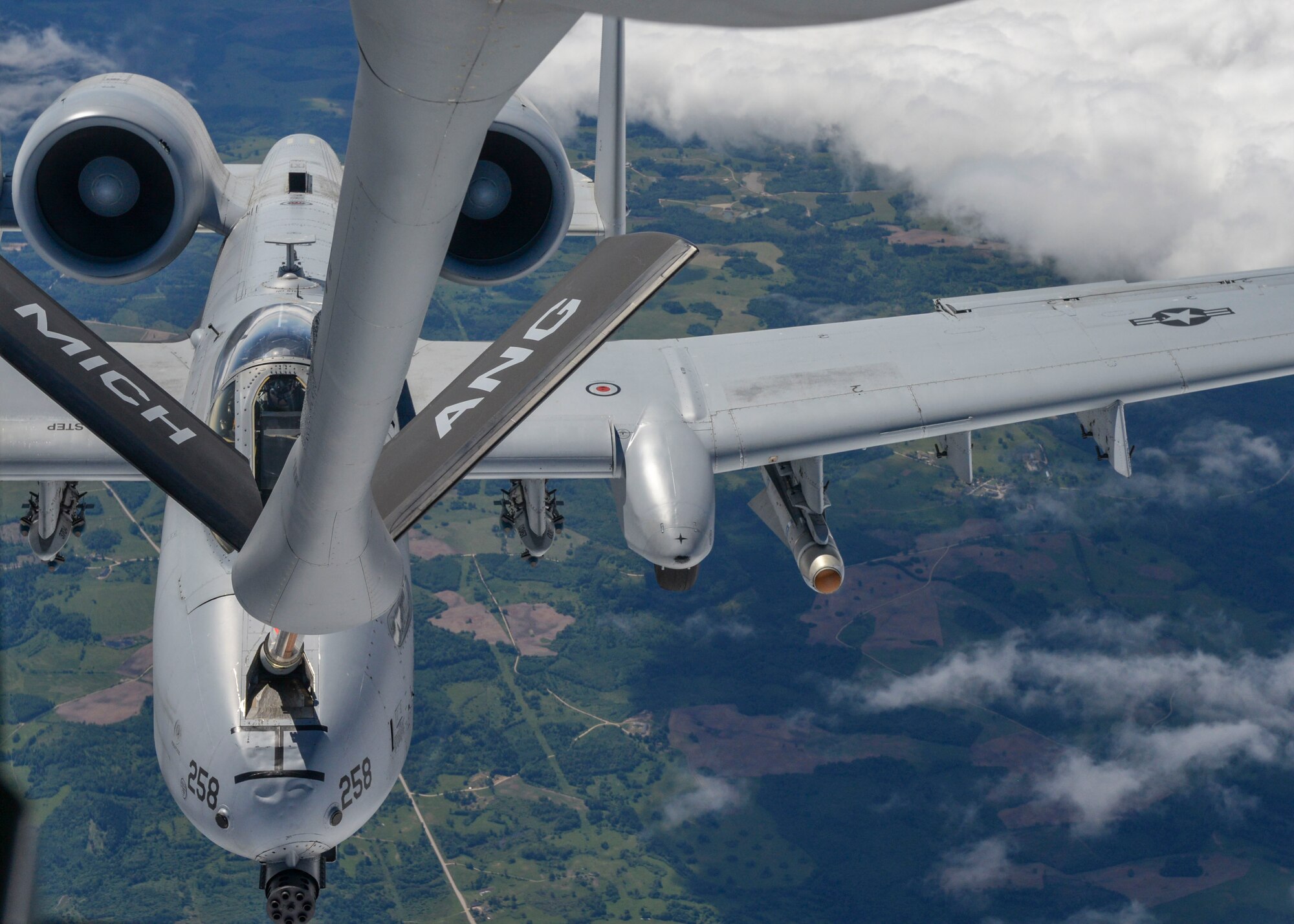A KC-135 Stratotanker refuels an A-10 Thunderbolt II during flight while partaking in Saber Strike 18 over Latvia on June 6, 2018. Both aircraft are from the 127th Wing at Selfridge Air National Guard Base, Michigan, and are deployed in Europe to support the exercise Saber Strike 18.  (U.S. Air Force photo by Staff Sgt. Jimmie D. Pike)