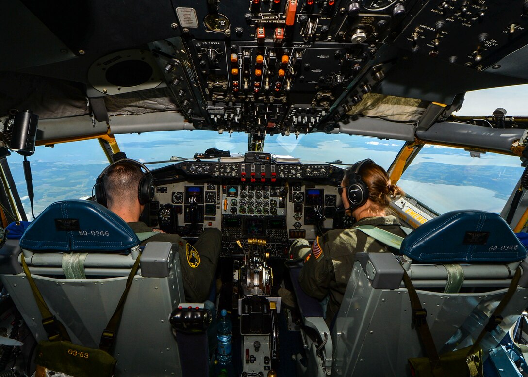 U.S. Air Force Maj. Luke Luikens and 1st Lt. Jennifer Logsdon, 171st Air Refueling Squadron KC-135 Stratotanker pilots, fly a KC-135 for a refueling mission during Saber Strike 18, June 8, 2018. During Saber Strike, KC-135s were used to refuel other aircraft such as the A-10 Thunderbolt II and the F-16 Fighting Falcon, to prolong their flight time for extended training scenarios. (U.S. Air Force photo by Staff Sgt. Jimmie D. Pike)