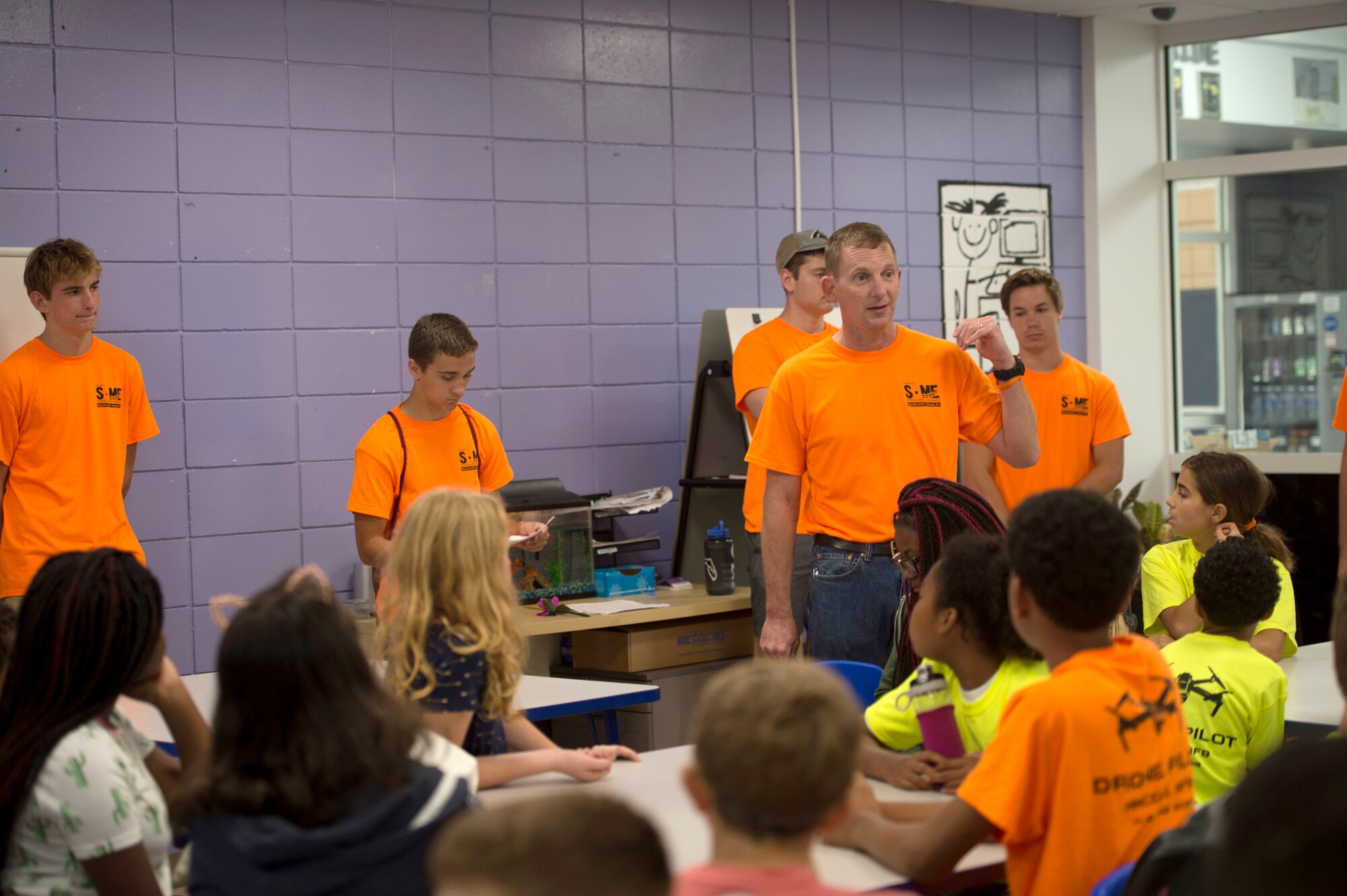 Vernie L. Reichling, a liaison officer with the U.S. Army Corps of Engineers, briefs children on safety during a Science Technology Engineering and Math camp June 5, 2018.