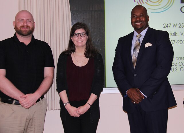 IMAGE: VIRGINIA BEACH, Va. (June 6, 2018) - Naval Surface Warfare Center Dahlgren Division Dam Neck Activity hosted their Lesbian, Gay, Bisexual and Transgender (LGBT) Pride Month Observance with Cory Gerwe and Elizabeth Nowell from the LGBT Life Center Norfolk.  Mr. Gerwe spoke about the LGBT community and provided information concerning resources and support available via the LGBT Life Center.  Nowell presented statistics on the LGBT community nationally. They are pictured with NSWCDD Dam Neck Activity's EEO representative, Marcus Matthews (right). For additional information concerning the LGBT Life Center Norfolk, please visit https://lgbtlifecenter.org.