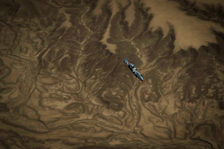 A U.S. Air Force A-10 Thunderbolt II assigned to the 163rd Fighter Squadron flies a mission over Afghanistan, May 28, 2018. The A-10, which can loiter near battle areas for extended periods of time and operate in low ceiling and visibility conditions, provides close-air support for coalition forces and the Afghan National Defense and Security Forces on the offensive against the Taliban. (U.S. Air Force photo by Staff Sgt. Corey Hook)