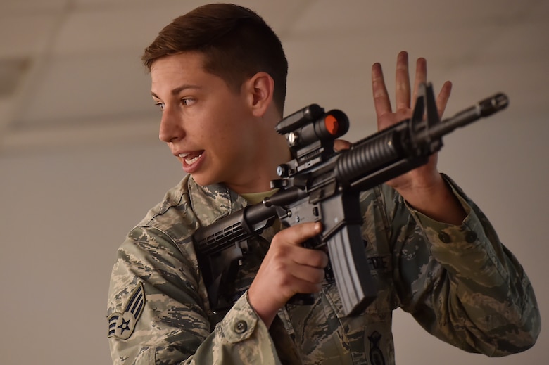 Senior Airman Dylan Ricketts, 628th Security Forces Squadron Combat Arms Training and Maintenance instructor, teaches the fundamentals of an M-4 rifle during a classroom session June 5, 2018, at Joint Base Charleston, S.C. CATM instructors at Joint Base Charleston support all military branches and are responsible for qualifying service members and civilians on various weapons.