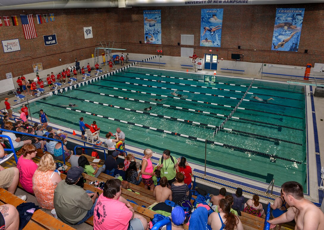 Attendees, participants and volunteers of the N.H. Special Olympics gather on June 1, 2017 at the University of New Hampshire Swasey Pool in Durham, N.H. Members of the 157th Air Refueling Wing volunteered their time to help facilitate the events as a N.H. Air National Guard community outreach effort. (N.H. Air National Guard photo by Staff Sgt. Kayla White)
