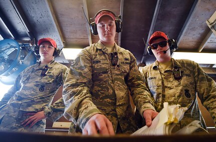 From left to right, Senior Airman Dylan Ricketts, Staff Sgt. Alexander Elder and Staff Sgt. Howard, all 628th Security Forces Squadron Combat Arms Training and Maintenance instructors, prepare to instruct an M-4 rifle qualifying course June 5, 2018, at Joint Base Charleston, S.C. CATM instructors at Joint Base Charleston support all military branches and are responsible for qualifying service members and civilians on various weapons.