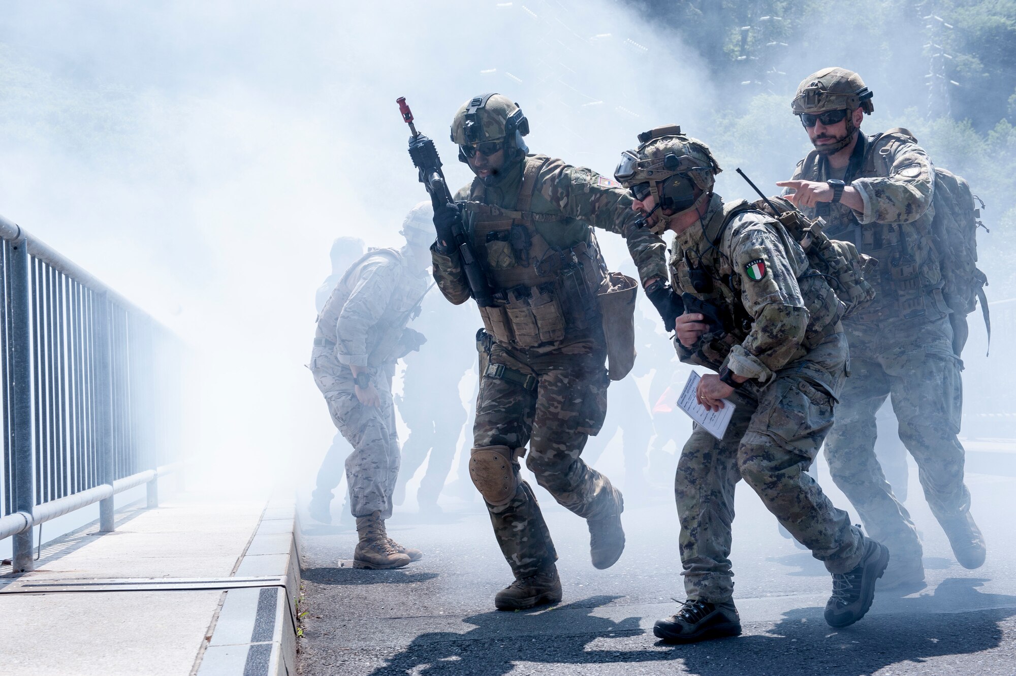 Joint terminal attack controllers from the Slovenian Armed Forces conduct urban warfare training exercises during Adriatic Strike 2018, Celje, Slovenia, June 4, 2018. The Colorado Air National Guard, 140th Wing, Buckley Air Force Base, Coloo. brought four F-16 Fighting Falcons and approximately 40 support personnel to participate in Adriatic Strike 2018, a Slovenian-led JTAC training attended by 22 other NATO nations to conduct interoperability training and joint readiness capabilities among the NATO allies and partners. (U.S. Air National Guard photo by Staff Sgt. Michelle Y. Alvarez-Rea)