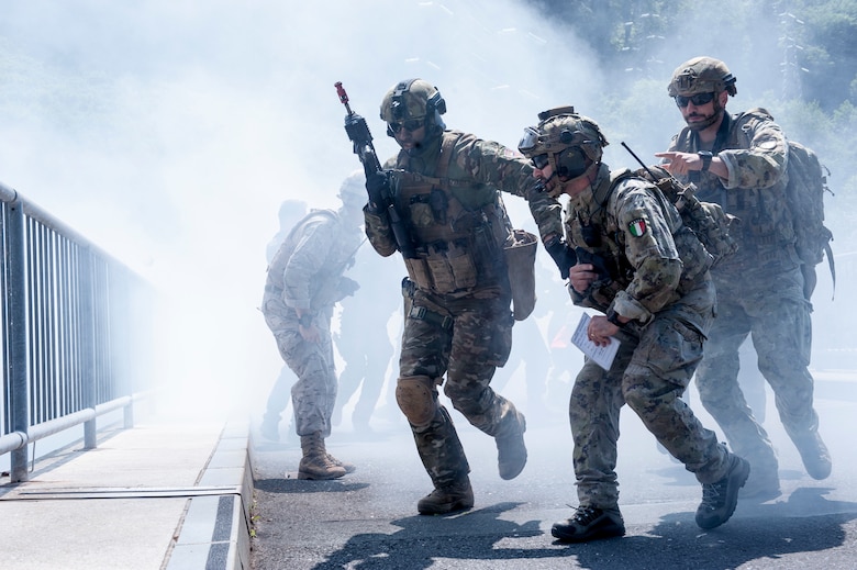 Joint terminal attack controllers from the Slovenian Armed Forces conduct urban warfare training exercises during Adriatic Strike 2018, Celje, Slovenia, June 4, 2018. The Colorado Air National Guard, 140th Wing, Buckley Air Force Base, Coloo. brought four F-16 Fighting Falcons and approximately 40 support personnel to participate in Adriatic Strike 2018, a Slovenian-led JTAC training attended by 22 other NATO nations to conduct interoperability training and joint readiness capabilities among the NATO allies and partners. (U.S. Air National Guard photo by Staff Sgt. Michelle Y. Alvarez-Rea)
