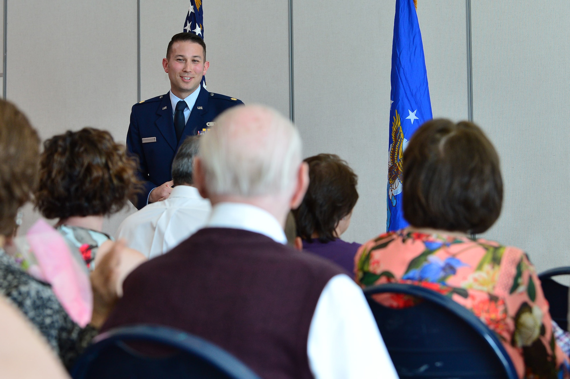 Maj. Phillip, 732nd Operations Group chief of intelligence, thanks his family for their continuous support during his promotion ceremony March 31, 2018, in Las Vegas. Phillip expressed how proud he is to be a third generation Airman and how grateful he is to carry on his family’s legacy. (U.S. Air Force photo by Airman 1st Class Haley Stevens)