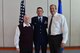 Maj. Phillip, 732nd Operations Group chief of intelligence (center), his grandfather Jerry (left) and his father Patrick (right) celebrate Maj. Phillip’s promotion March 31, 2018, in Las Vegas. Jerry and Patrick have also served in the U.S. Air Force and retired after more than 20 years. (U.S. Air Force photo by Airman 1st Class Haley Stevens)