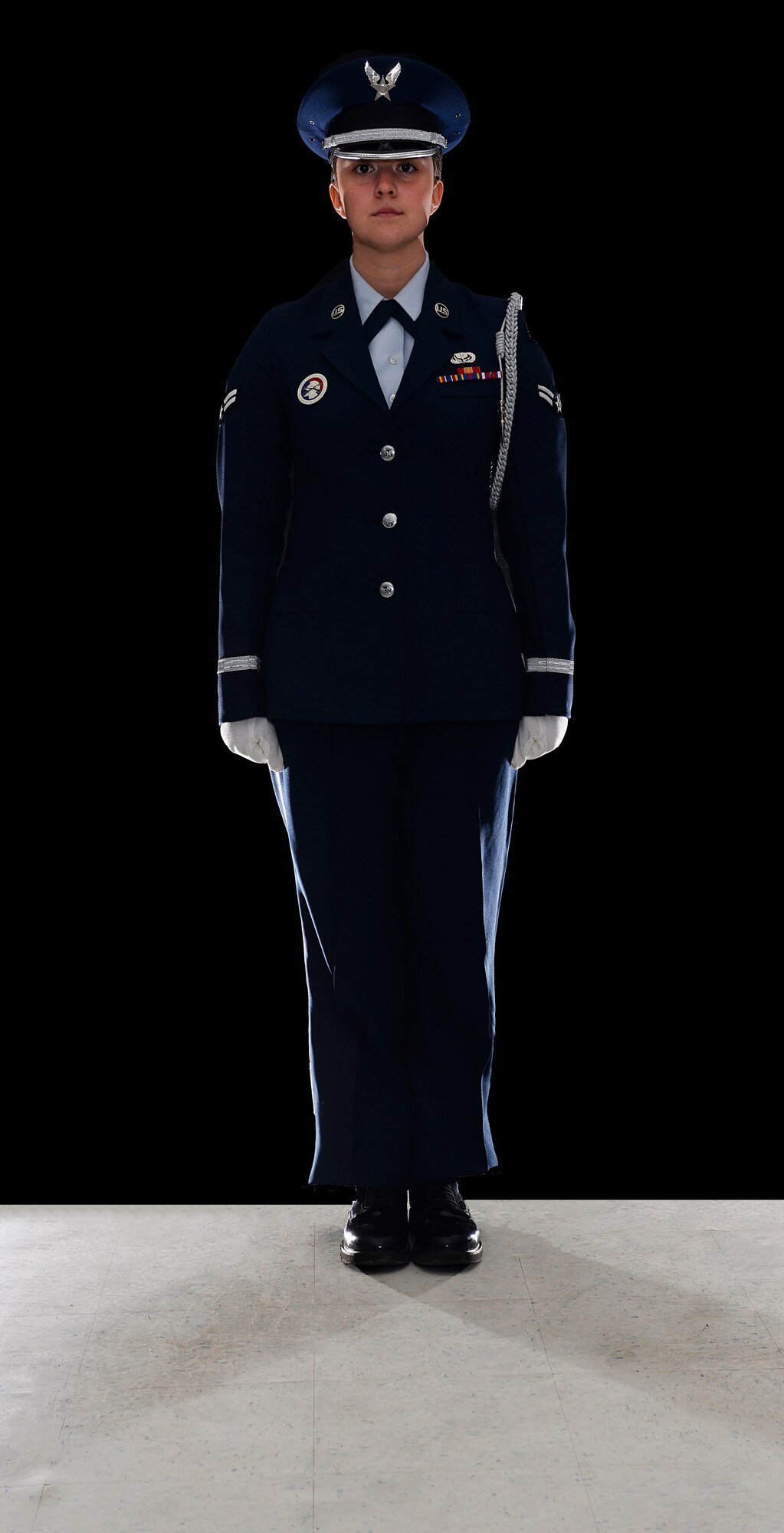 Airman 1st Class Julia C. Schultz, assigned to the 157th Force Support Squadron, poses for a portait on June 7, 2018 at Pease Air National Guard Base, N.H. Schultz has served as a member of the Pease Base Honor Guard for more than a year. (N.H. Air National Guard photo illustration by Staff Sgt. Kayla White)
