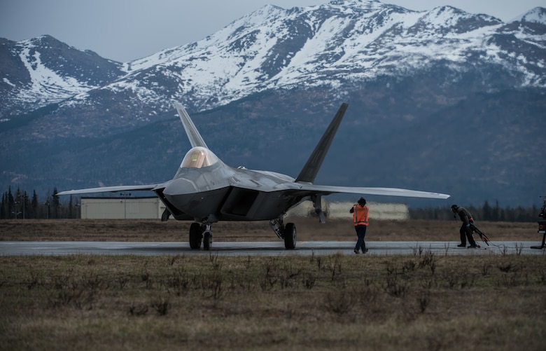 An F-22 Raptor refuels at Joint Base Elmendorf-Richardson, Alaska, May 10, 2018. The F-22’s combination of stealth, supercruise, maneuverability, and integrated avionics, coupled with improved supportability, represents an exponential leap in warfighting capabilities. The Raptor performs both air-to-air and air-to-ground missions allowing full realization of operational concepts vital to the 21st century Air Force.