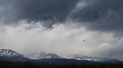An F-22 Raptor soars over the Chugach Mountains near Joint Base Elmendorf-Richardson, Alaska, May 10, 2018. The F-22’s combination of stealth, supercruise, maneuverability, and integrated avionics, coupled with improved supportability, represents an exponential leap in warfighting capabilities. The Raptor performs both air-to-air and air-to-ground missions allowing full realization of operational concepts vital to the 21st century Air Force.