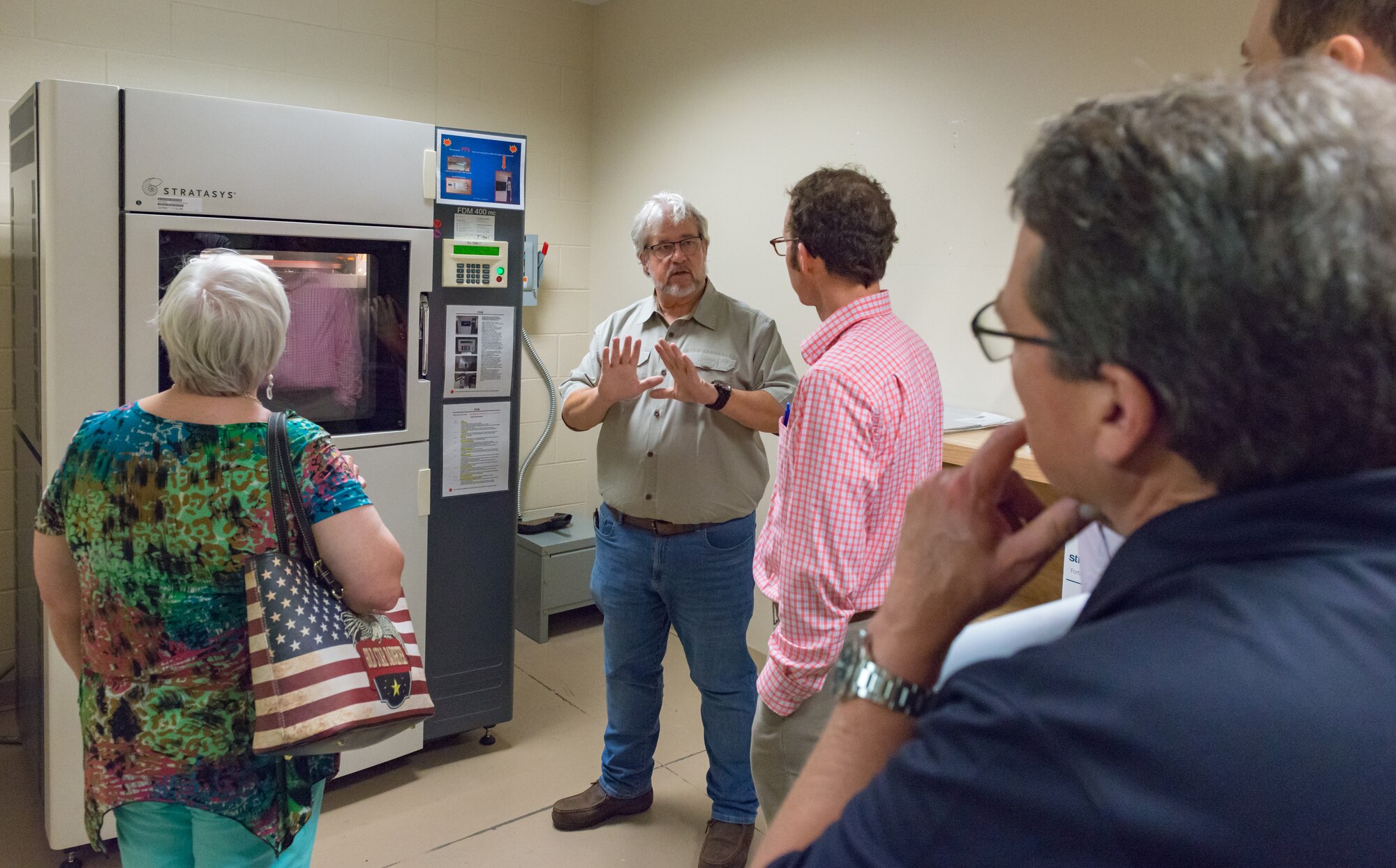 James Hall, 81st Training Support Squadron chief production contractor, briefs local community leaders on the capabilities of the 3D printer at the Trainer Development Center during an 81st Training Group Honorary Commanders' tour at Keesler Air Force Base, Mississippi, June 7, 2018. The purpose of the tour is to better educate the honorary commanders on the 81st TRG mission and capabilities. (U.S. Air Force photo by Andre Askew)