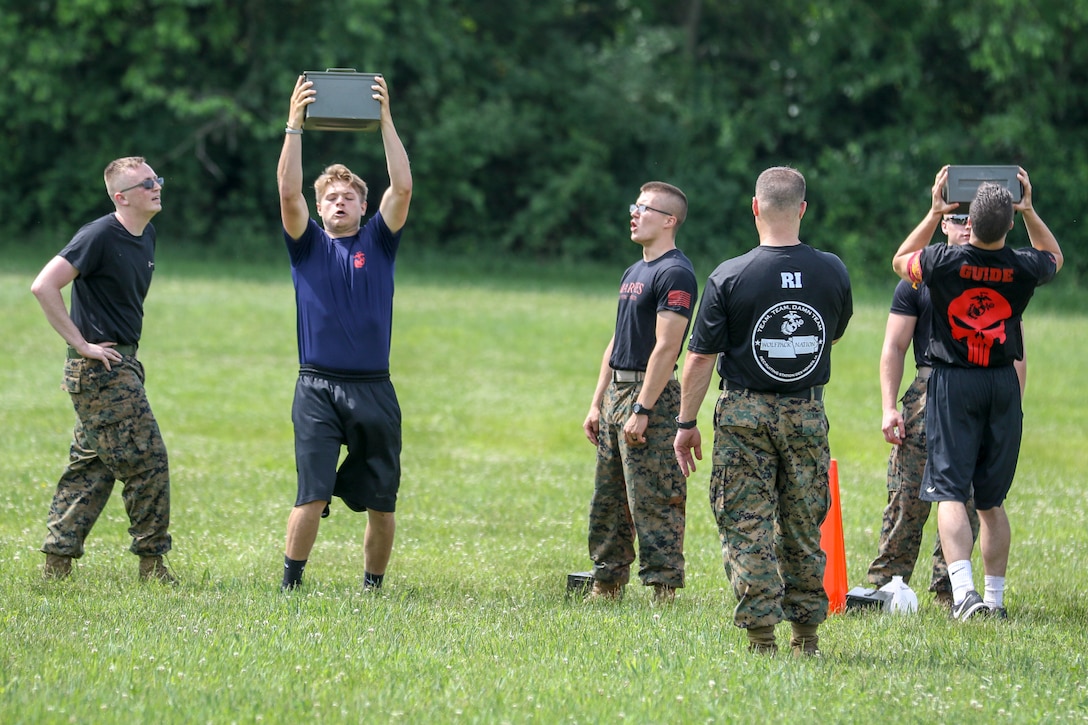 Nearly 200 young men and women from the upper Midwest attended Recruiting Station Des Moines’ All-Hands Future Marine function, June 6-7, at Camp Dodge, Iowa, to prepare for recruit training.
The future Marines, commonly known as poolees, traveled from Nebraska, South Dakota, Illinois, Wisconsin and across Iowa to take part in team building and physical training events they will experience at either Marine Corps Recruit Depot Parris Island, S.C., or MCRD San Diego, Calif.
During the all-hands function, each of the 10 recruiting substations, or RSS, competed against one another in events such as log runs, where Marines and their poolees donned flak jackets and Kevlar helmets and raced against other teams while holding a log. Other events were more individual-based such as the initial strength test, or IST, which is a shortened version of the Marine Corps physical fitness test.