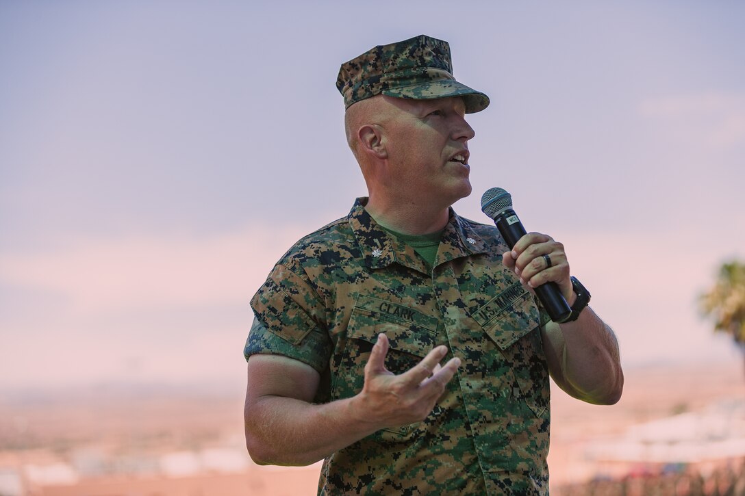 Lt. Col. Erick T. Clark, off-going commanding officer, 1st Battalion, 7th Marine Regiment, gives a speech during the unit’s change of command ceremony aboard the Marine Corps Air Ground Combat Center, Twentynine Palms, Calif., June 4, 2018. The change of command ceremony ensures that the unit and its Marines are never without official leadership, and also signifies an allegiance of Marines to their unit’s commander. (U.S. Marine Corps photo by Lance Cpl. Rachel K. Porter)