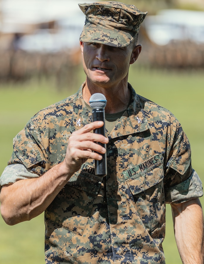 Col. Kyle B. Ellison, commanding officer, 7th Marine Regiment, gives a speech commemorating the new commanding officer of 1st Battalion, 7th Marine Regiment aboard the Marine Corps Air Ground Combat Center, Twentynine Palms, Calif., June 4, 2018. The change of command ceremony ensures that the unit and its Marines are never without official leadership, and also signifies an allegiance of Marines to their unit’s commander. (U.S. Marine Corps photo by Lance Cpl. Rachel K. Porter)