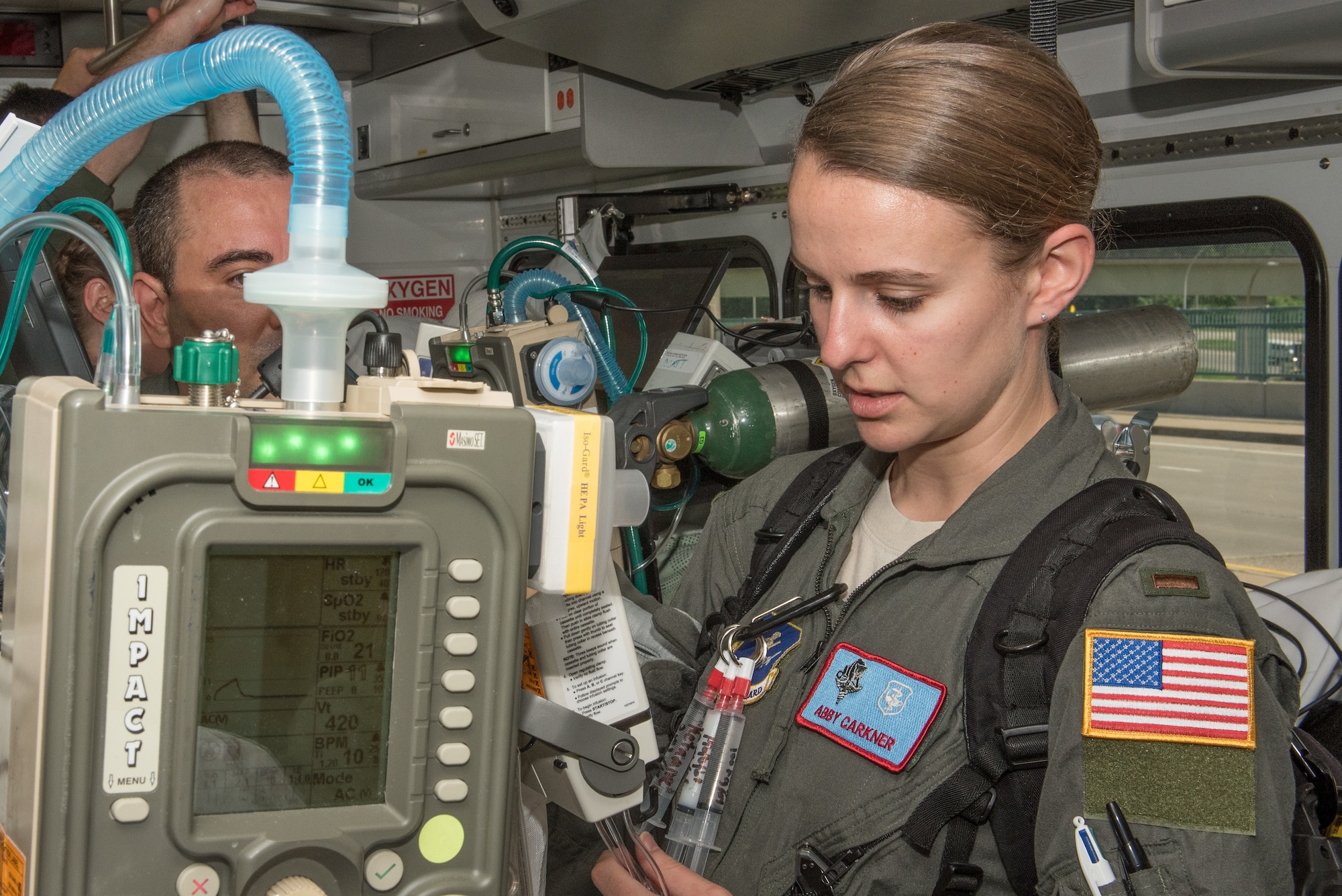 2nd Lt. Abby Carkner, a Critical Care Air Transport Team physician with the 109th Airlift Wing, New York Air National Guard, checks patient vitals and equipment functionality during the CCATT training event in Minneapolis, Minn., May 31, 2018. (U.S. Air Force photo by Master Sgt. Eric Amidon)
