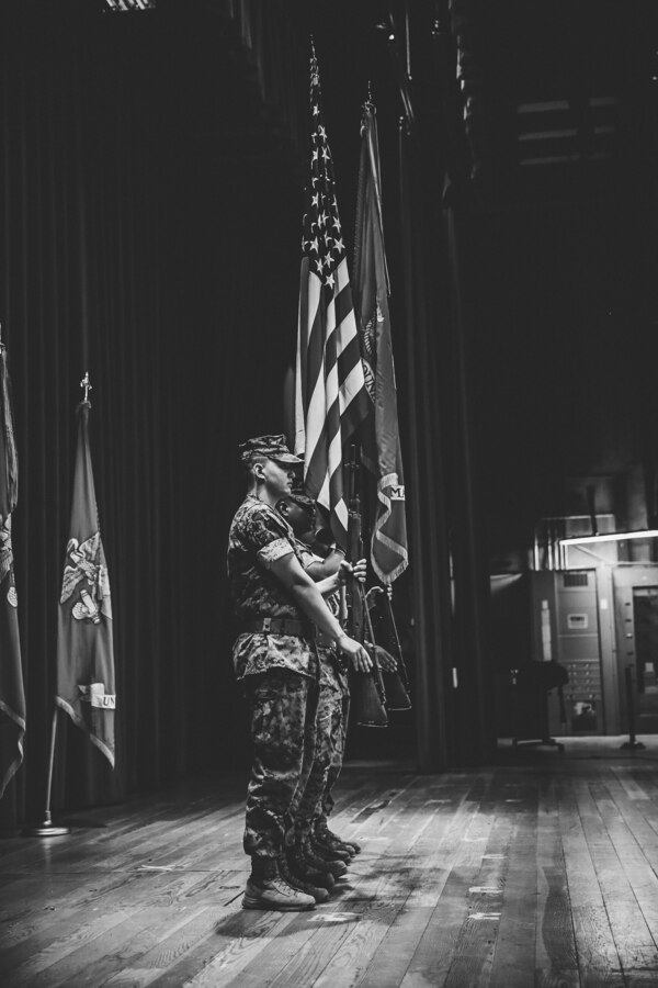 The Headquarters Battalion Color Guard prepares to present colors during the Marine Corps Air Ground Combat Center’s change of command ceremony in which Maj. Gen. William F. Mullen III relinquished command to Brig. Gen. Roger Turner aboard the Combat Center, Twentynine Palms, Calif., June 8, 2018. The change of command ceremony ensures that the unit and its Marines are never without official leadership, and also signifies an allegiance of Marines to their unit commander. (U.S. Marine Corps photo by Lance Cpl. William Chockey)