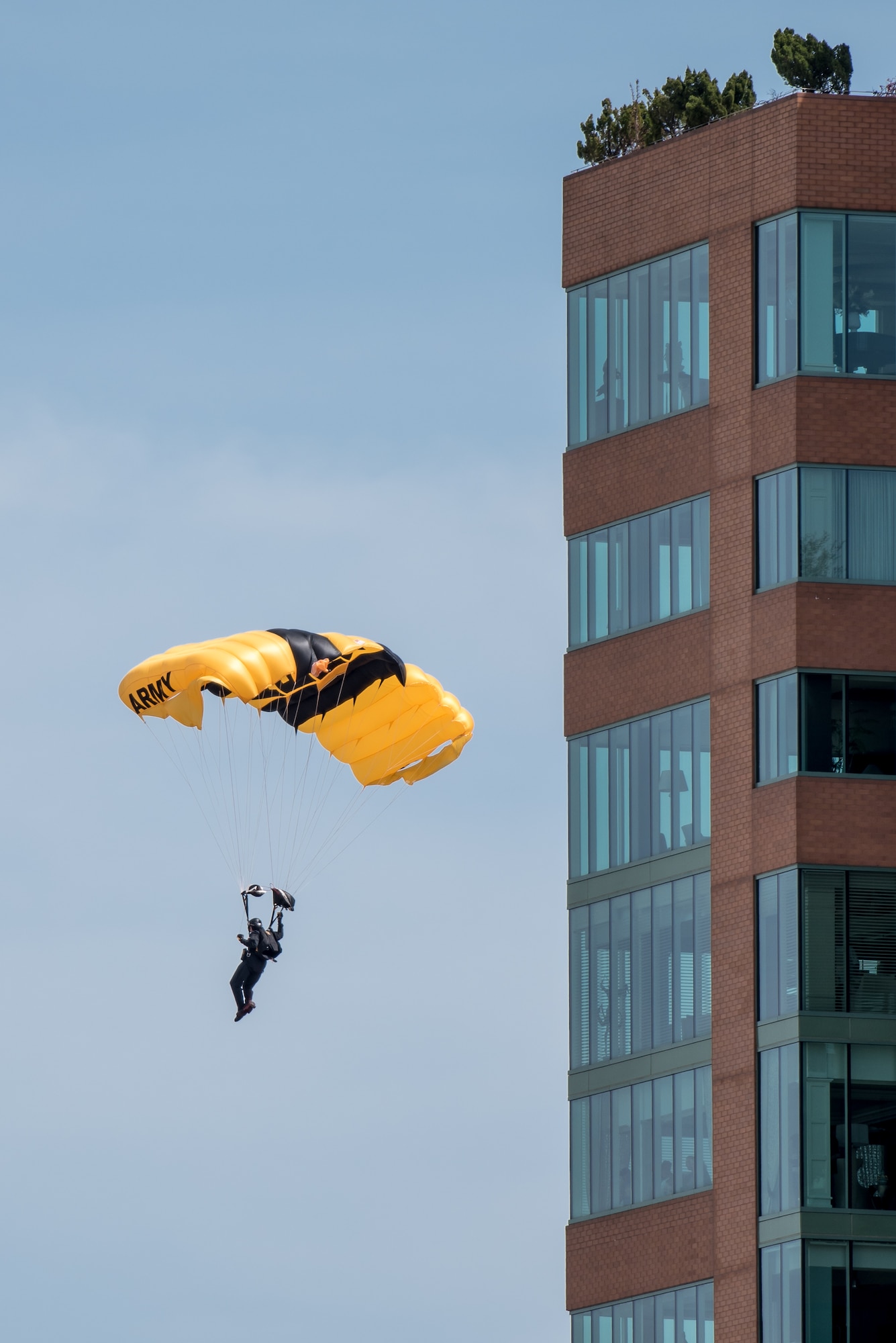 A Soldier from the U.S. Army's Golden Knights parachute demonstration team floats toward Waterfront Park in downtown Louisville, Ky., April 21, 2018, to kick off the Thunder Over Louisville air show. This year’s show drew a crowd of more than 500,000 to the banks of the Ohio River. (U.S. Air National Guard photo by Lt. Col. Dale Greer)