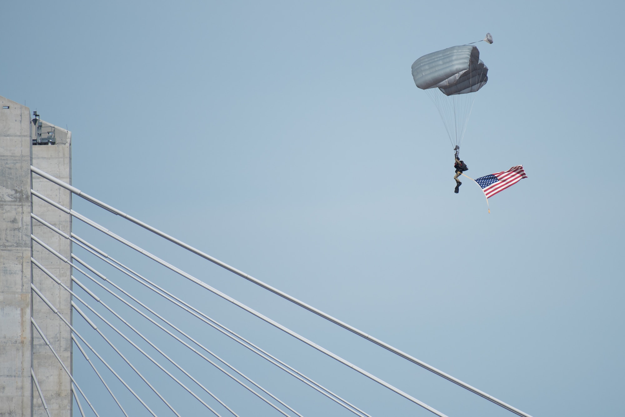 A special operator from the Kentucky Air National Guard’s 123rd Special Tactics Squadron parachutes into the Ohio River from a C-130 aircraft during the Thunder Over Louisville air show in Louisville, Ky., April 21, 2018. The squadron is comprised of combat controllers, pararescuemen, special operations weathermen and special tactics officers. (U.S. Air National Guard photo by Lt. Col. Dale Greer)
