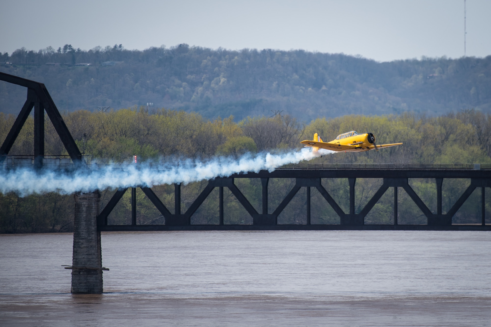 The Canadian Harvard Aerobatic Team performs an aerial demonstration over the Ohio River April 21, 2018, during the Thunder Over Louisville air show in Louisville, Ky. This year’s event drew a crowd of more than 500,000 spectators. (U.S. Air National Guard photo by Lt. Col. Dale Greer)