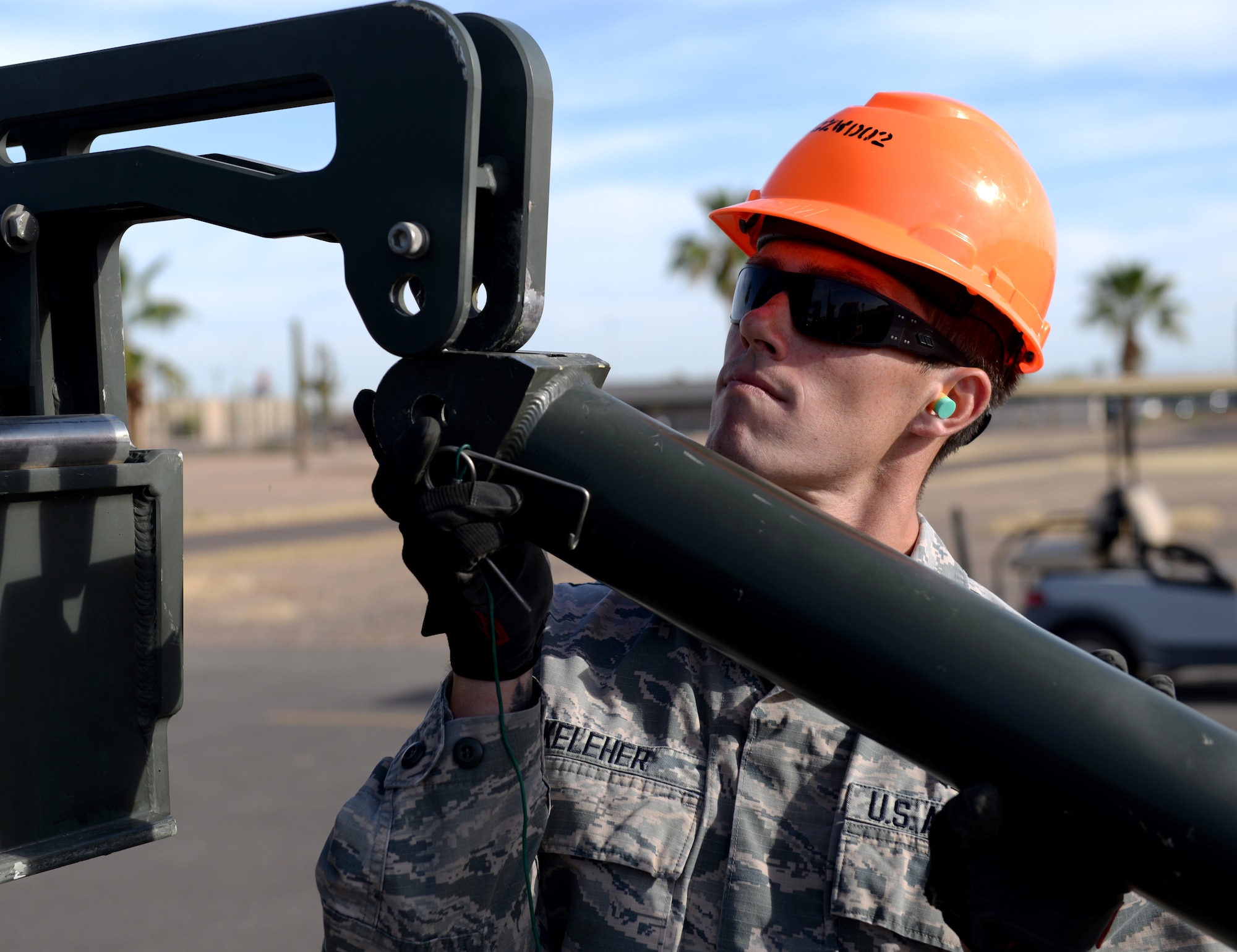 Senior Airman Corey Keleher, 56th Equipment Maintenance Squadron conventional weapons crew chief, assembles bomb-building equipment during a practice for the Air Force Combat Munitions competition June 6, 2018, at Luke Air Force Base, Ariz. The AFCO comp, taking place June 11-14, 2018, at Beale Air Force Base, Calif., will pit seven teams of ammo maintainers from bases around the world against each other in challenges that simulate the tasks required of them in combat operations. (U.S. Air Force photo by Senior Airman Ridge Shan)