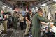 A joint medical team from the Mississippi Air National Guard’s 183rd Air Evacuation Squadron and Joint Base San Antonio, Texas, helps members of the Guatemalan government load critically injured patients on a Mississippi ANG's 172nd Airlift Wing C-17 Globemaster III in Guatemala, June 6, 2018. The humanitarian aeromedical evacuation mission followed the recent eruption of Fuego Volcano. (U.S. Air National Guard photo by Tech. Sgt. Edward Staton)