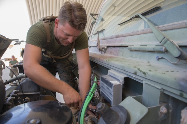 Lance Cpl. Gage Vielee, a motor transport mechanic with Truck Company, 23rd Marine Regiment, 4th Marine Division, inspects, maintains, and repairs a fleet of motor transport vehicles supporting the Marines of Marine Air Ground Task Force 23, during Integrated Training Exercise 4-18, in Twentynine Palms, California, on June 8, 2018. Vielee is one of over 5,500 Marines from Reserve units located across the United States participating in ITX 4-18, the largest annual Marine Forces Reserve training exercise.