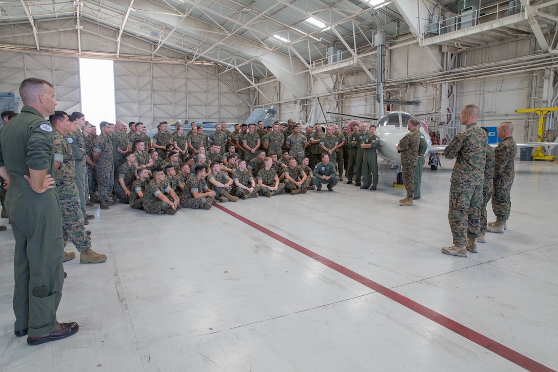 Senior leaders of 23rd Marine Regiment, 4th Marine Division, and Marine Aircraft Group 41, 4th Marine Aircraft Wing, speak with Marines from Marine Fighter Attack Squadron 112, MAG-41, 4th MAW, during Integrated Training Exercise 4-18 in Miramar, California, on June 9, 2018. Marine Aircraft Group 41 is fulfilling the Air Combat Element role of ITX 4-18, providing essential support to Ground Combat Elements of Marine Air Ground Task Force 23. (Photo by U.S. Marine Corps Lance Cpl. Samantha Schwoch/released)