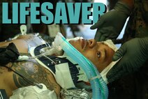 A Navy field medical corpsman with 3rd Medical Battalion, 3rd Marine Logistics Group simulates being a patient during Exercise Inochi No Onjin at Kin Blue, Okinawa, Japan, June 6, 2018. This exercise increased the competency of patient evacuation, command and control, medical regulating, and role-two capabilities of several medical units across the island. The multitude of patient evacuations with cooperation from the Marines, Navy, Army, and Air Force strengthen interoperability between joint services on en-route care. (U.S. Marine Corps photo by Lance Cpl. Harrison Rakhshani)