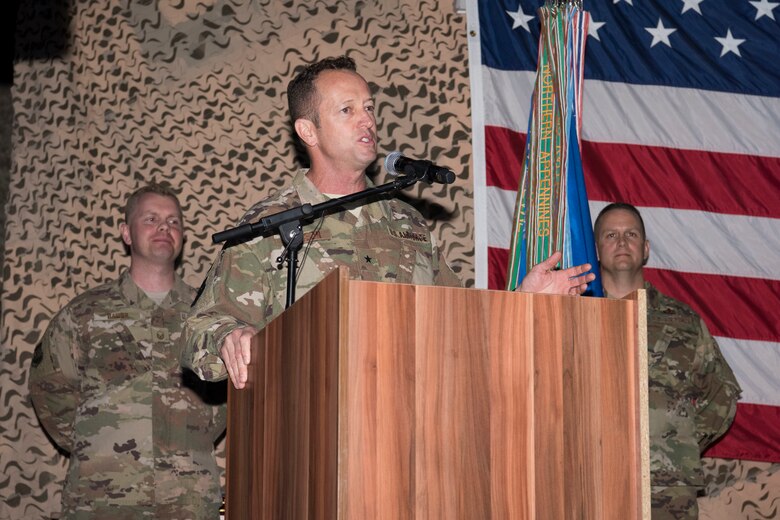 Brig. Gen. David Iverson provides a few remarks as the newest 332nd Air Expeditionary Wing commander during a change of command ceremony, June 9, 2018, at an undisclosed location in Southwest Asia.