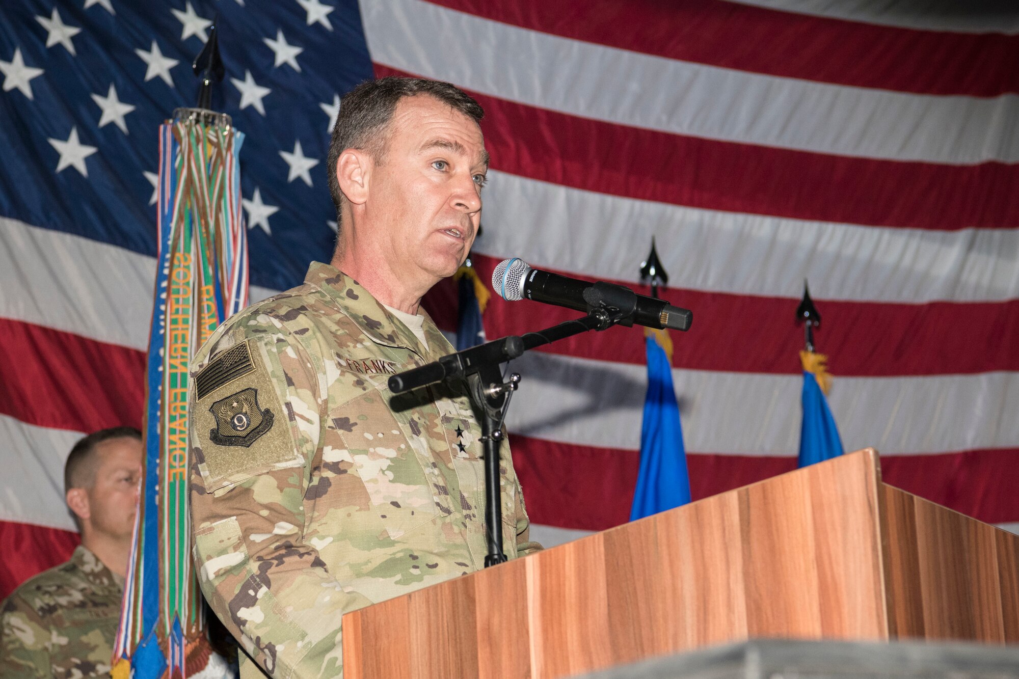 Maj. Gen. Chad Franks, 9th Air Expeditionary Task Force - Levant commander and presiding officer speaks to the members of the 332nd Air Expeditionary Wing during a change of command ceremony, June 9, 2018, at an undisclosed location in Southwest Asia.