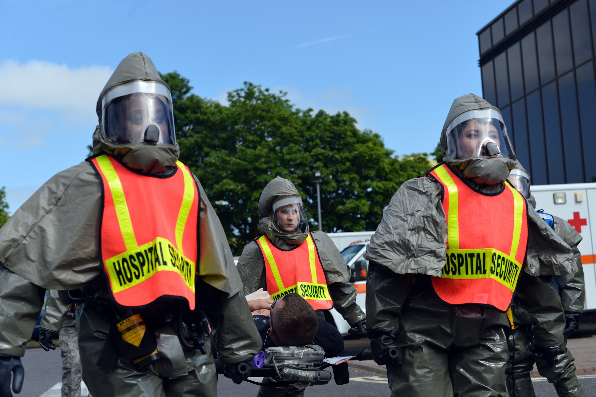 48th Medical Group Airmen transport a patient with simulated injuries following a mass casualty scenario during a readiness exercise at Royal Air Force Lakenheath, England, June 5, 2018. Conducting 24-hour operations during the two-day exercise, 48th Fighter Wing Airmen tested their Ability to Survive and Operate during wartime conditions. (U.S. Air Force photo by Master Sgt. Eric Burks)